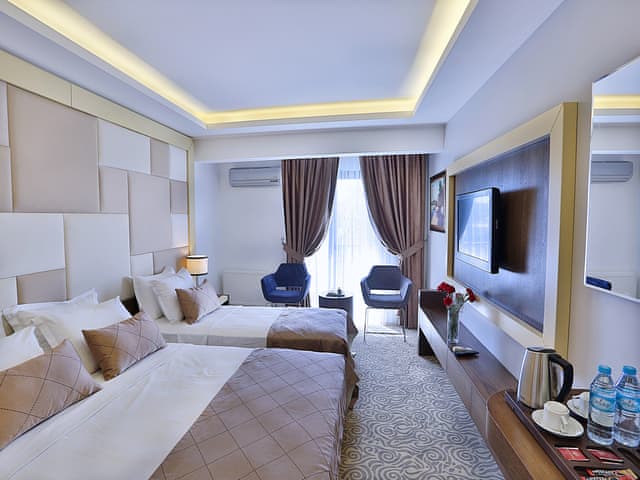 Delüks Üç Kişilik Oda