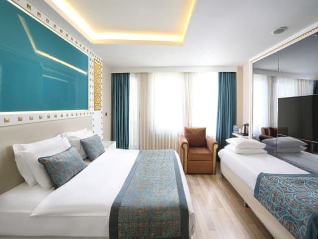 Superior Triple Room with Balcony