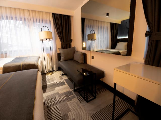 Delüks Üç Kişilik Oda