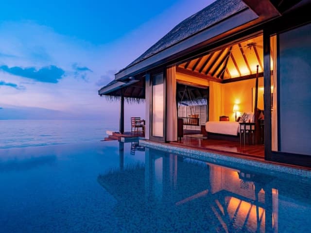 Sunset Over Water Pool Villa