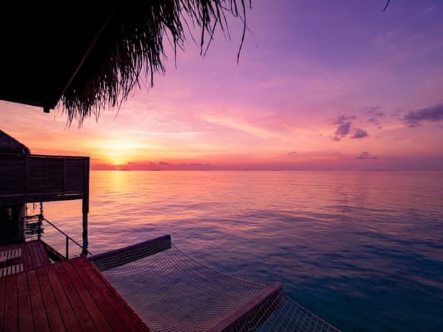 Sunset Over Water Pool Villa