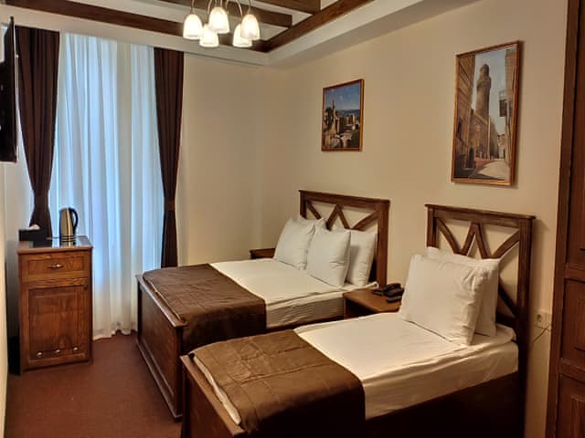 Delüks Üç Kişilik Oda