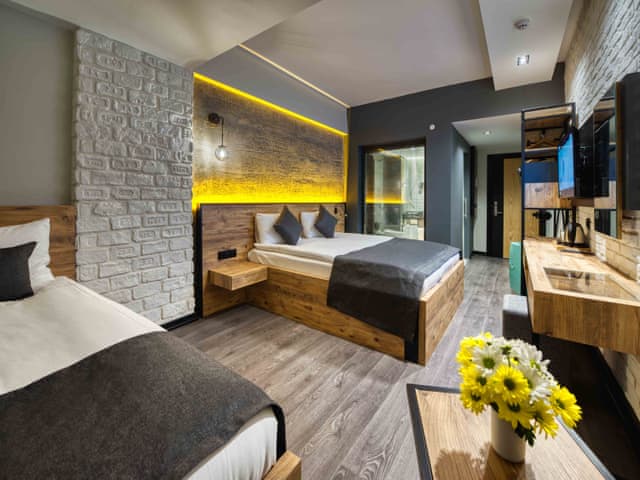 Delüks Üç Kişilik Oda