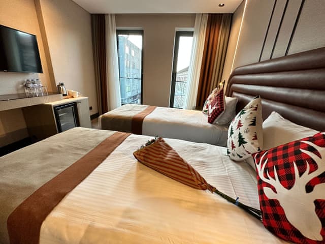 Delüks Üç Kişilik Oda