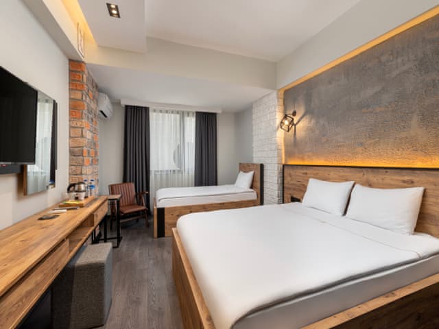 Delüks Üç Kişilik Oda