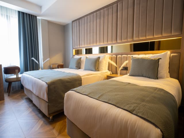 Delüks Üç Kişilik Oda