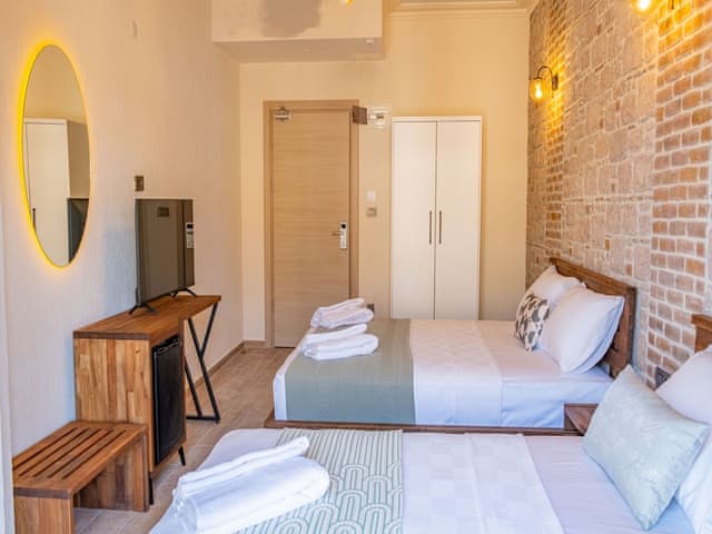 Superior Triple Room, Balcony, Partial Sea View
