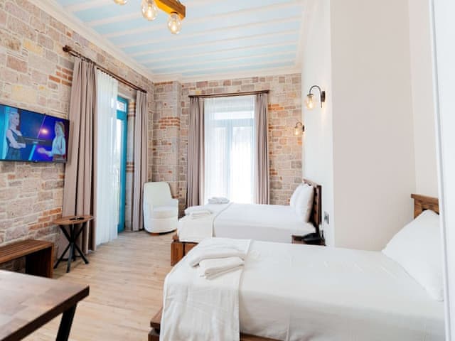 Delüks Üç Kişilik Oda