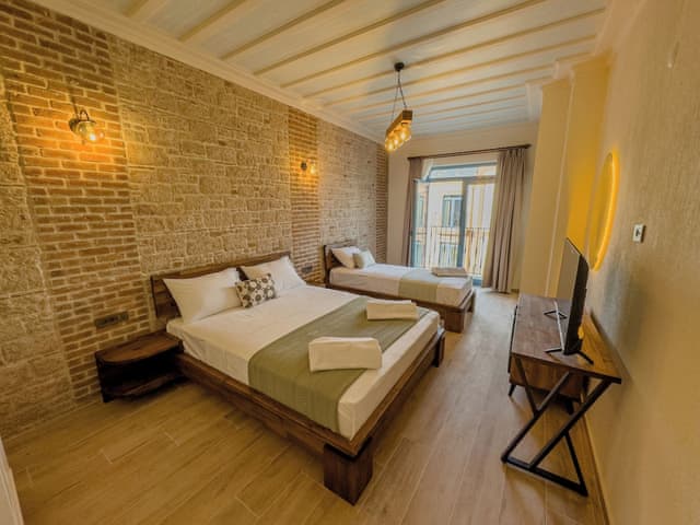 Superior Triple Room, Balcony, Partial Sea View