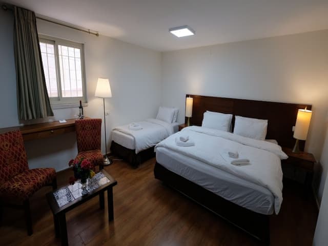 Family Room (1 Double Bed + 1 Single Bed)