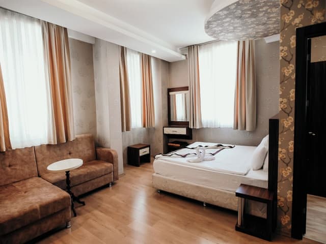 Delüks Üç Kişilik Oda