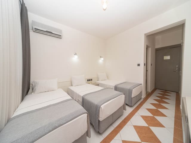 Economy Triple Room, Balcony