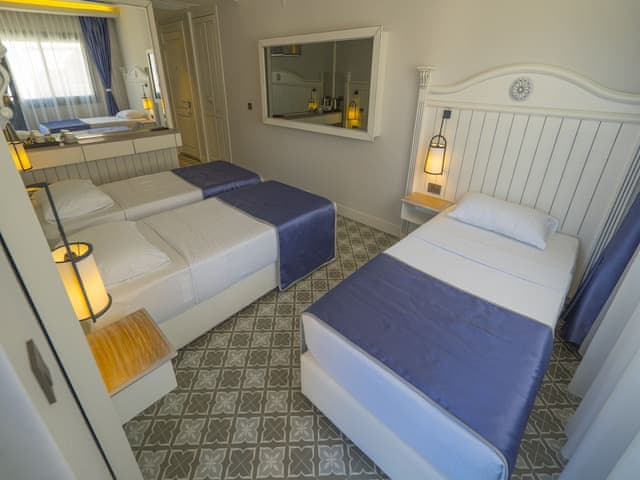 Standard Triple Room, Multiple Beds, Partial Sea View