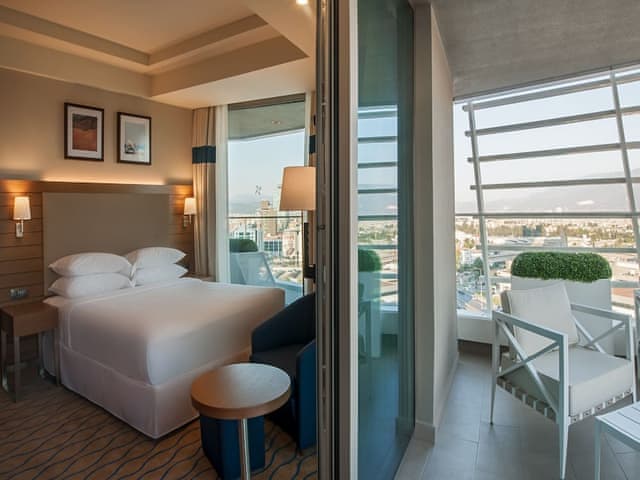 Room, 1 King Bed, Balcony, City View (Corner)