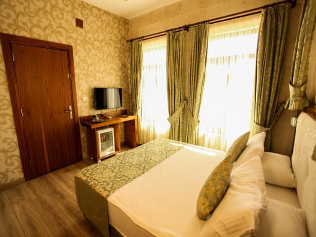 Deluxe Çift Kişilik veya İki Tek Kişilik Yataklı Oda