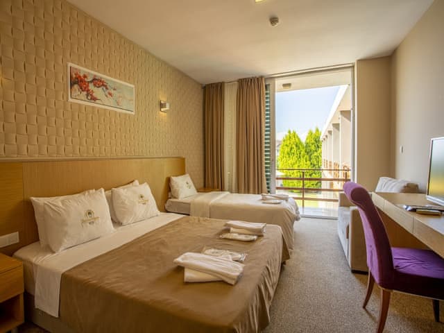 Delüks Üç Kişilik Oda