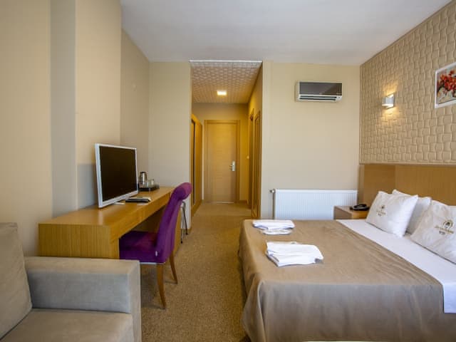 Delüks Üç Kişilik Oda