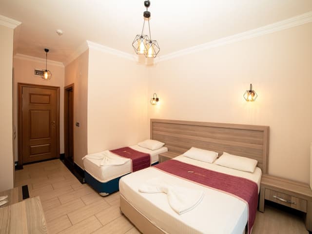 Triple Room, Balcony, Garden View