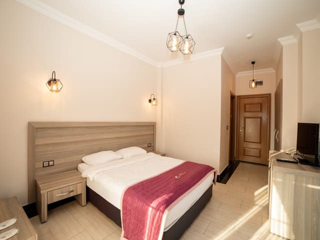 Standard Double Room, Balcony, Garden View