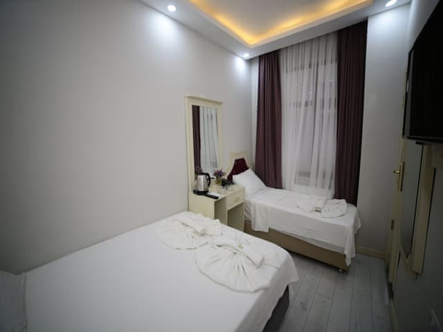 Ekonomik Üç Kişilik Oda