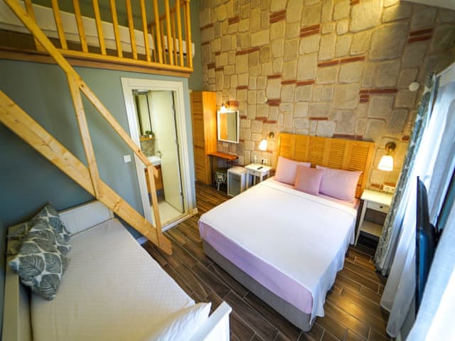 Chambre Quadruple Deluxe