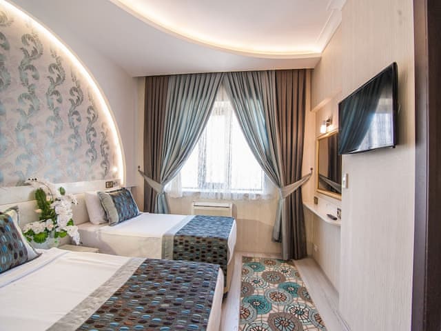 Deluxe Çift Kişilik veya İki Tek Kişilik Yataklı Oda