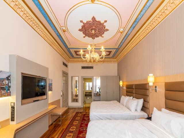 Delüks Üç Kişilik Oda