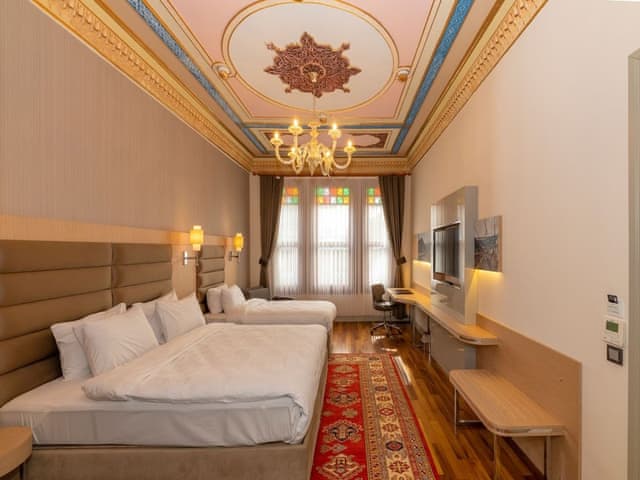 Delüks Üç Kişilik Oda