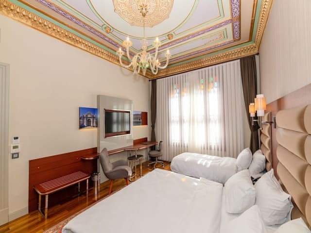 Delüks Üç Kişilik Oda