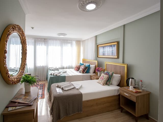 Deluxe Triple Room, Multiple Beds, Sea View