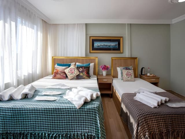 Delüks Üç Kişilik Oda