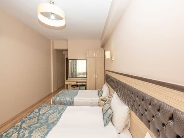 Delüks Üç Kişilik Oda