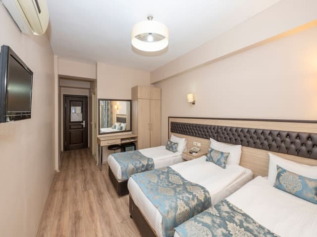 Delüks Üç Kişilik Oda