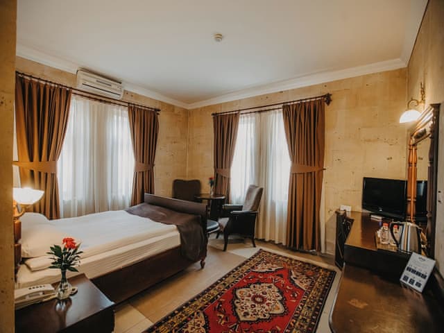 Deluxe Quadruple Stone Room