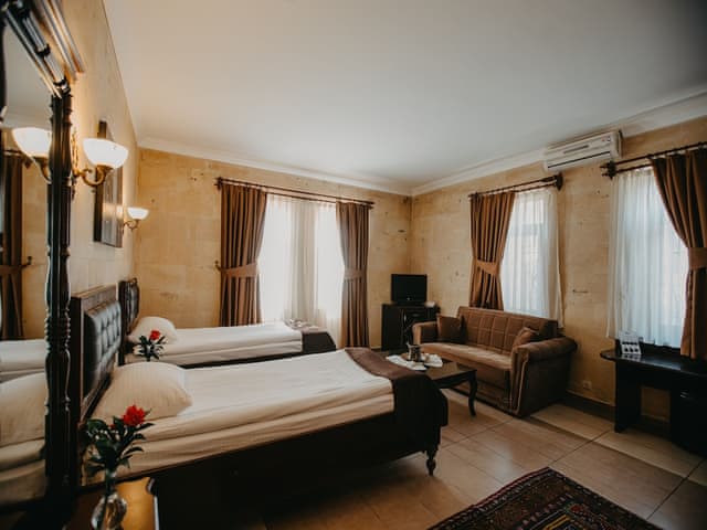 Deluxe Quadruple Stone Room