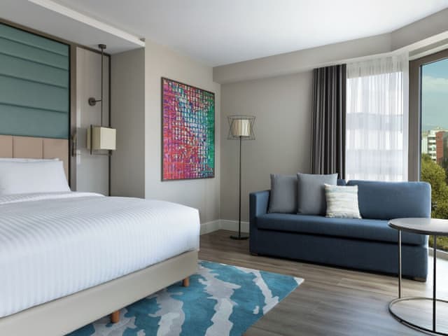 Family Room, 1 King Bed with Sofa bed, Partial Sea View (Corner)