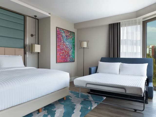 Family Room, 1 King Bed with Sofa bed, Partial Sea View (Corner)