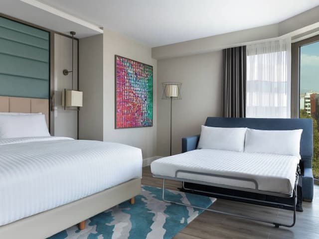 Family Room, 1 King Bed with Sofa bed, Partial Sea View (Corner)