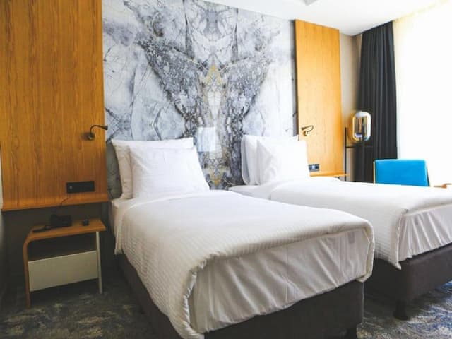 Delüks Üç Kişilik Oda