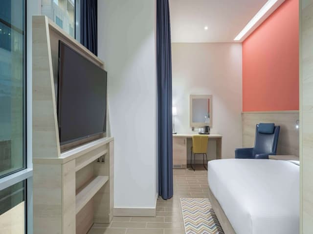 1 Queen Bed with Sofa bed City View