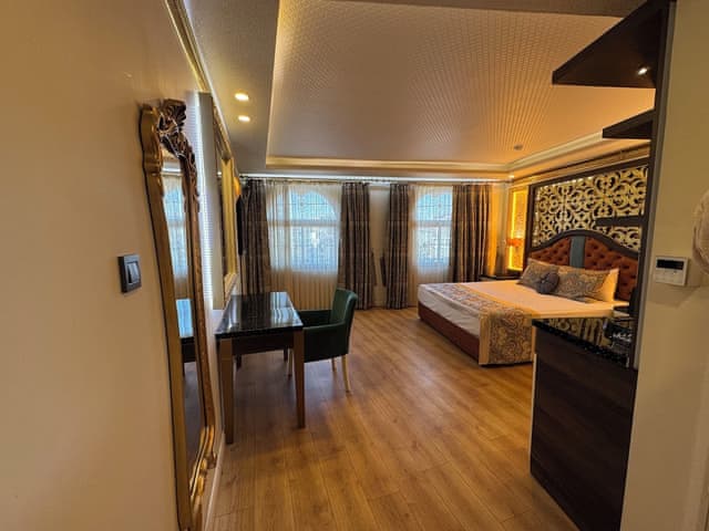 Deluxe Tek Buyuk Yatakli